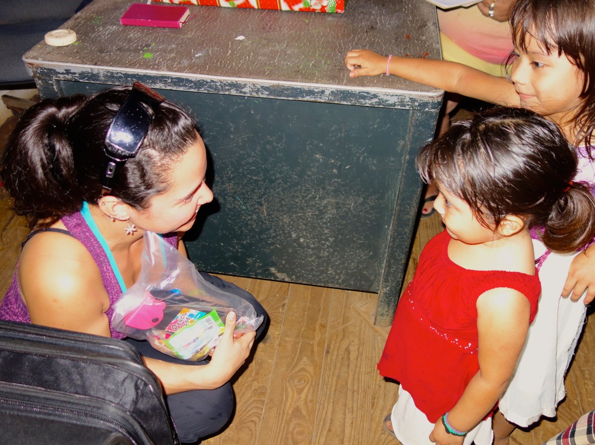 Distributing toys @ Casa Guatemala - Karina Noriega