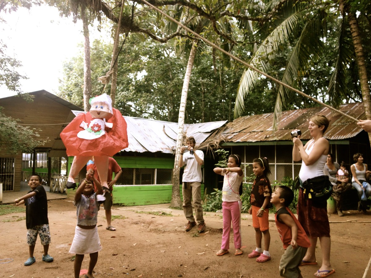 First crack at the piñata - Karina Noriega