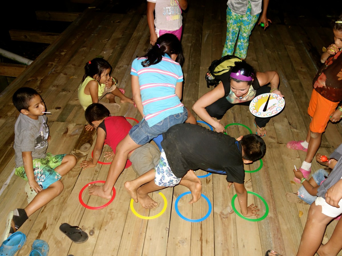 Trying out a new game we brought - Karina Noriega