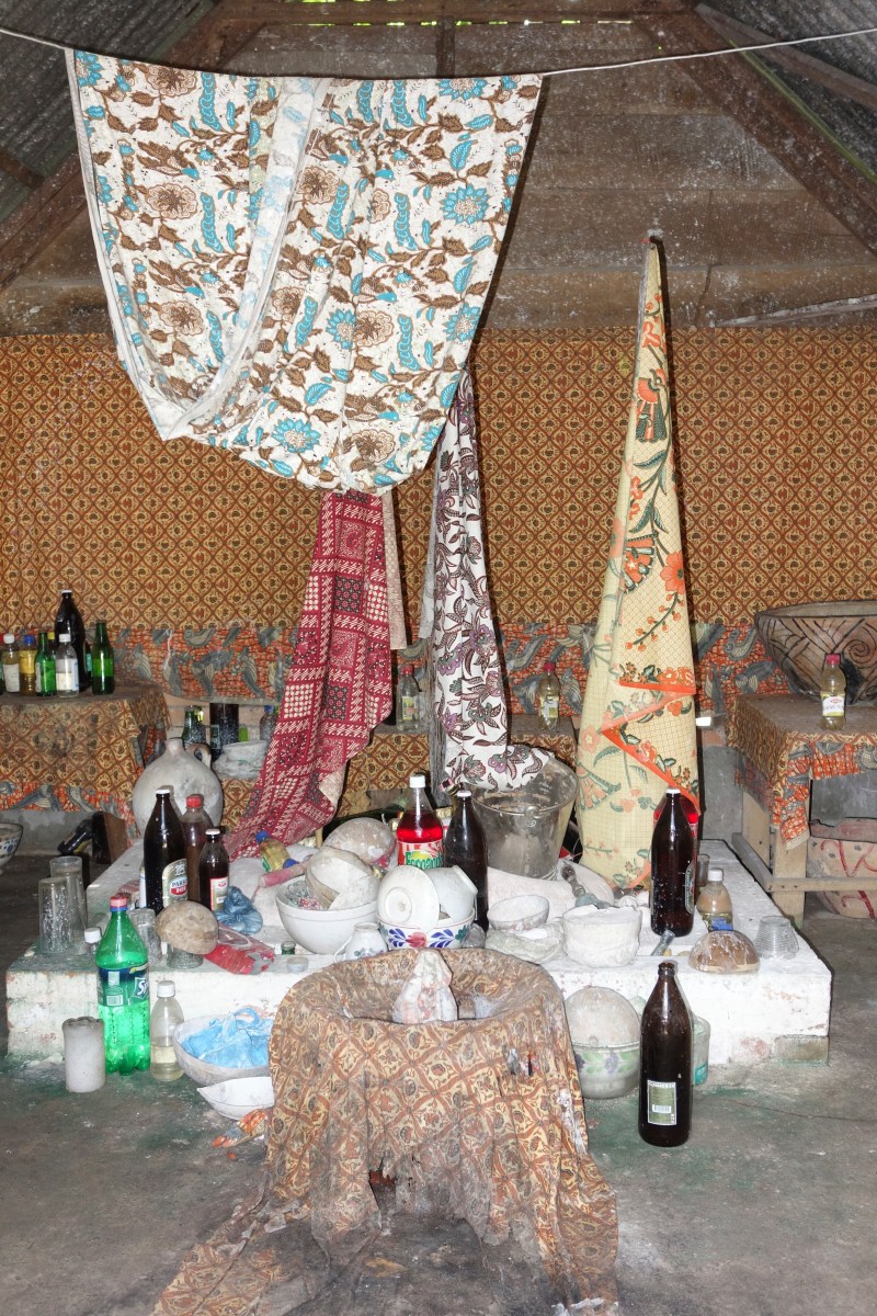 Inside a 'spirit house' - gifts are left to appeased the spirit - Santigron, Suriname -- Karina Noriega