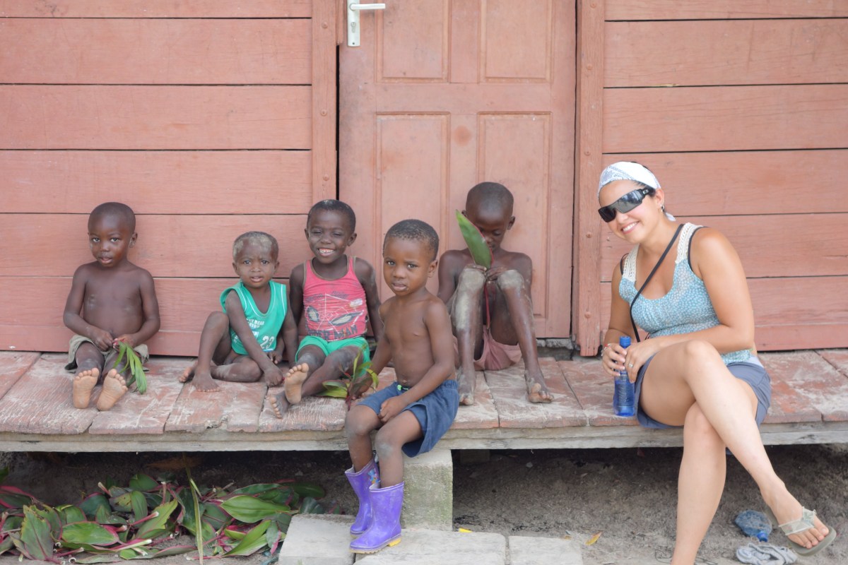 Before they got comfortable with me the little boy in green would scream in terror if the foreigners got to close - Santigron, Suriname -- Karina Noriega