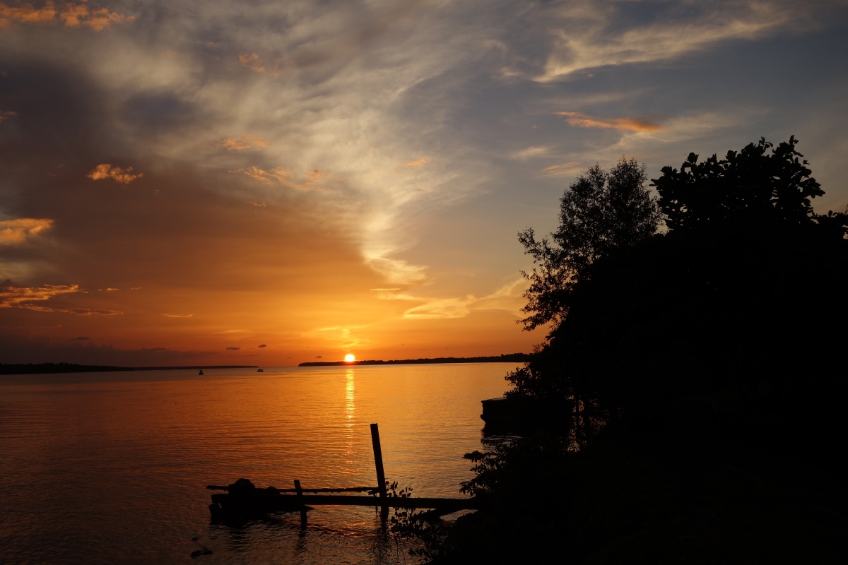 Sunset over the river - Paramaribo, Suriname -- Karina Noriega