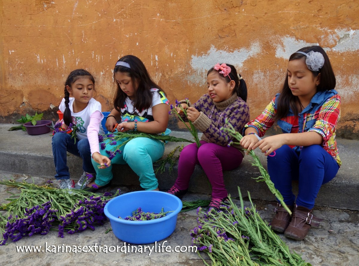 Second Grade girls work on the flowers for the alfombra collaboration. Antigua, Guatemala -- Karina Noriega