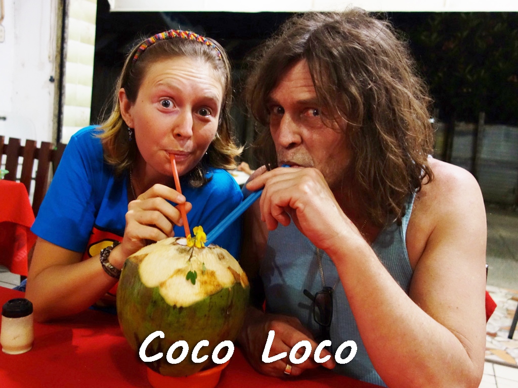 April and her Dad enjoying fresh a fresh CocoLoco (coco water with rum) in Livingston, Guatemala --Karina Noriega