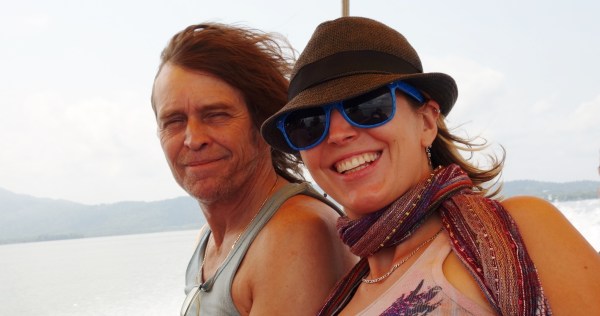 April and her Dad floating on the Rio Dulce, through the jungle, on route to Livingston. Rio Dulce, Guatemala. -- Karina Noriega